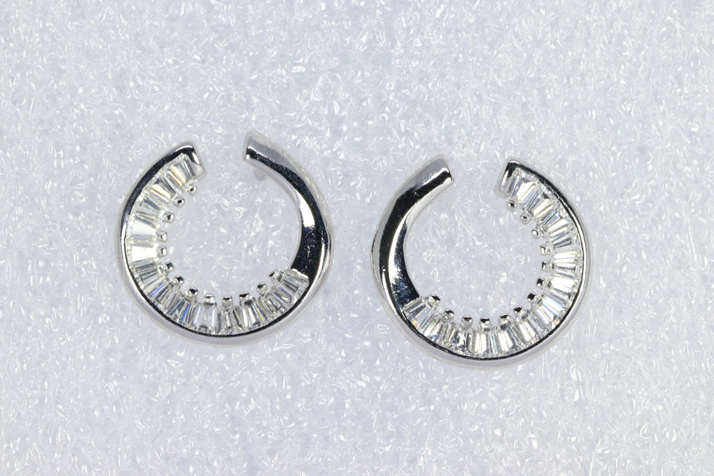 Twinkling Curve Silver Baguette Studs